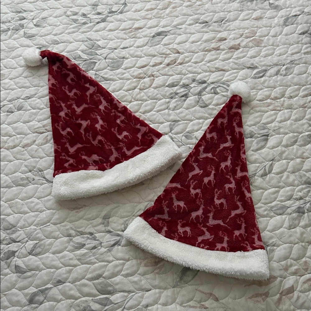 Red and White Santa Hats with Reindeer Pattern